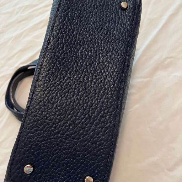 Like new Kate Spade handbag. Pristine condition. Navy and white stripe. - Picture 4 of 6
